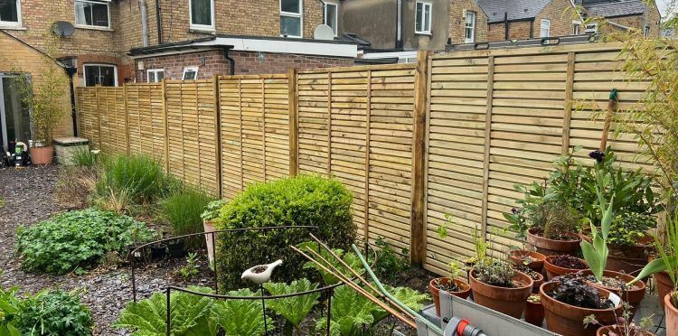 Double-sided slatted fencing in Cowley, Oxford